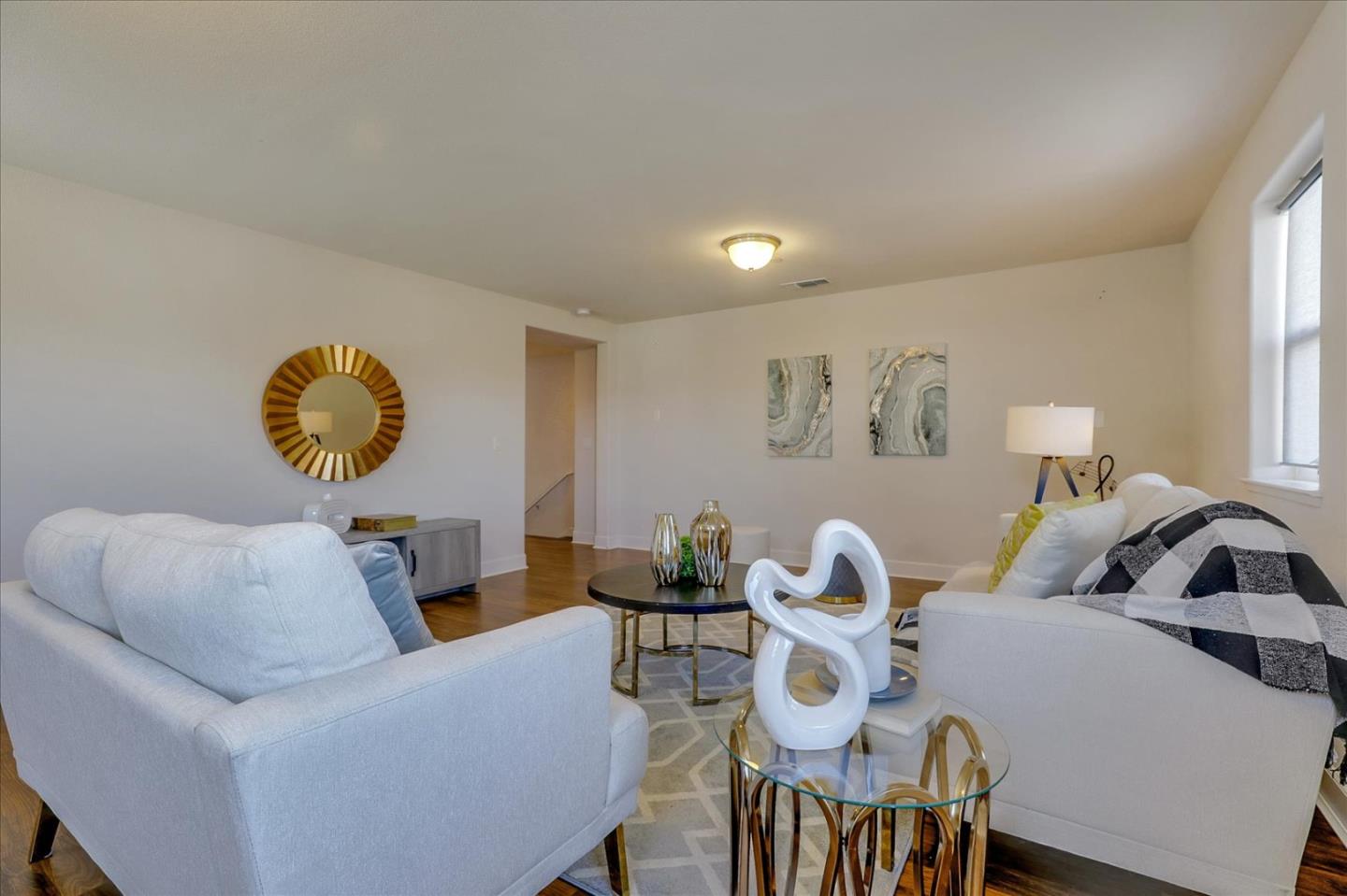 1081 Cabrillo Drive Hollister, CA 95023 - Photo 14 of 60 a living room with furniture and a window