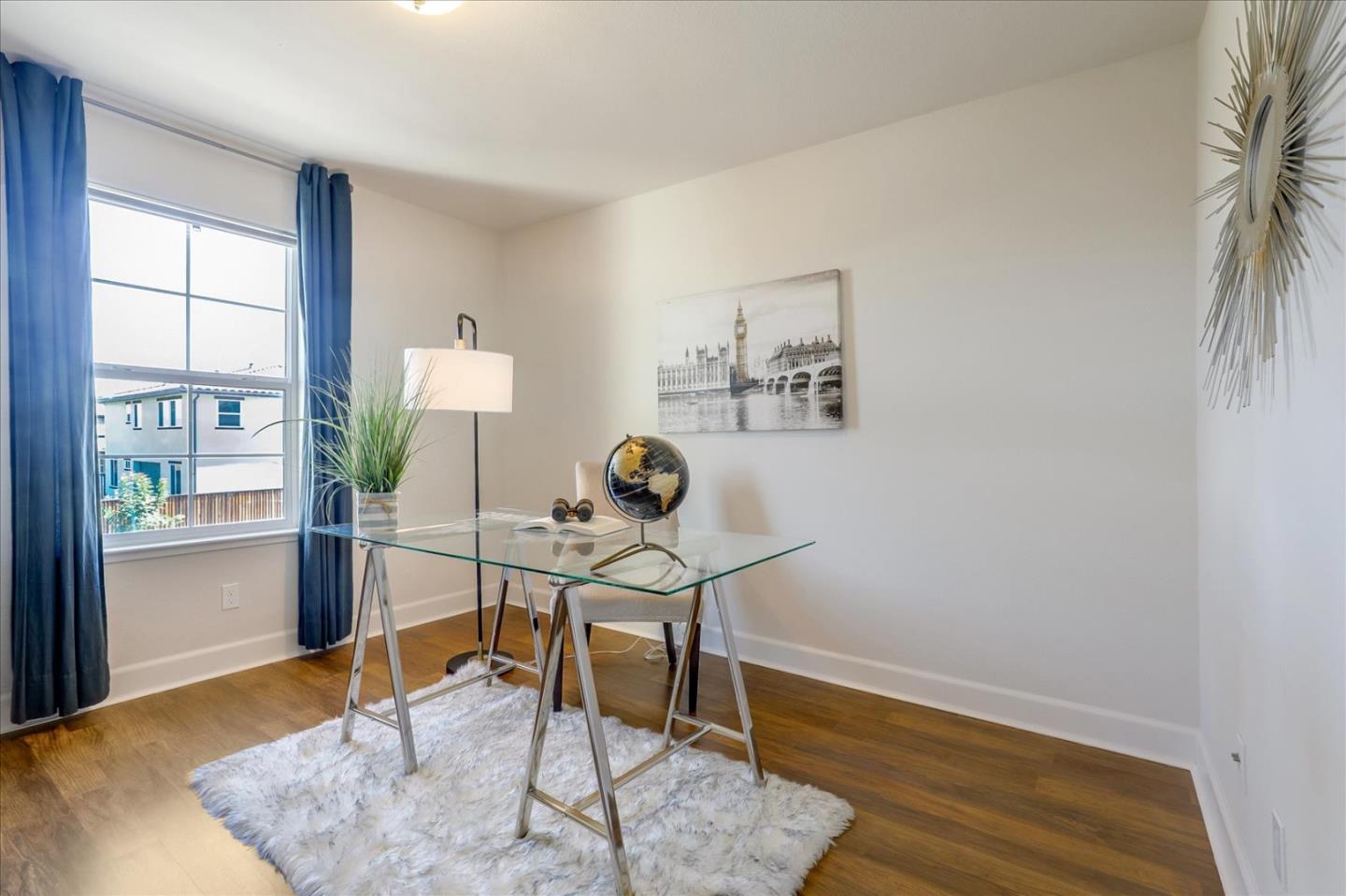 1081 Cabrillo Drive Hollister, CA 95023 - Photo 19 of 60 a view of a workspace with furniture and a window