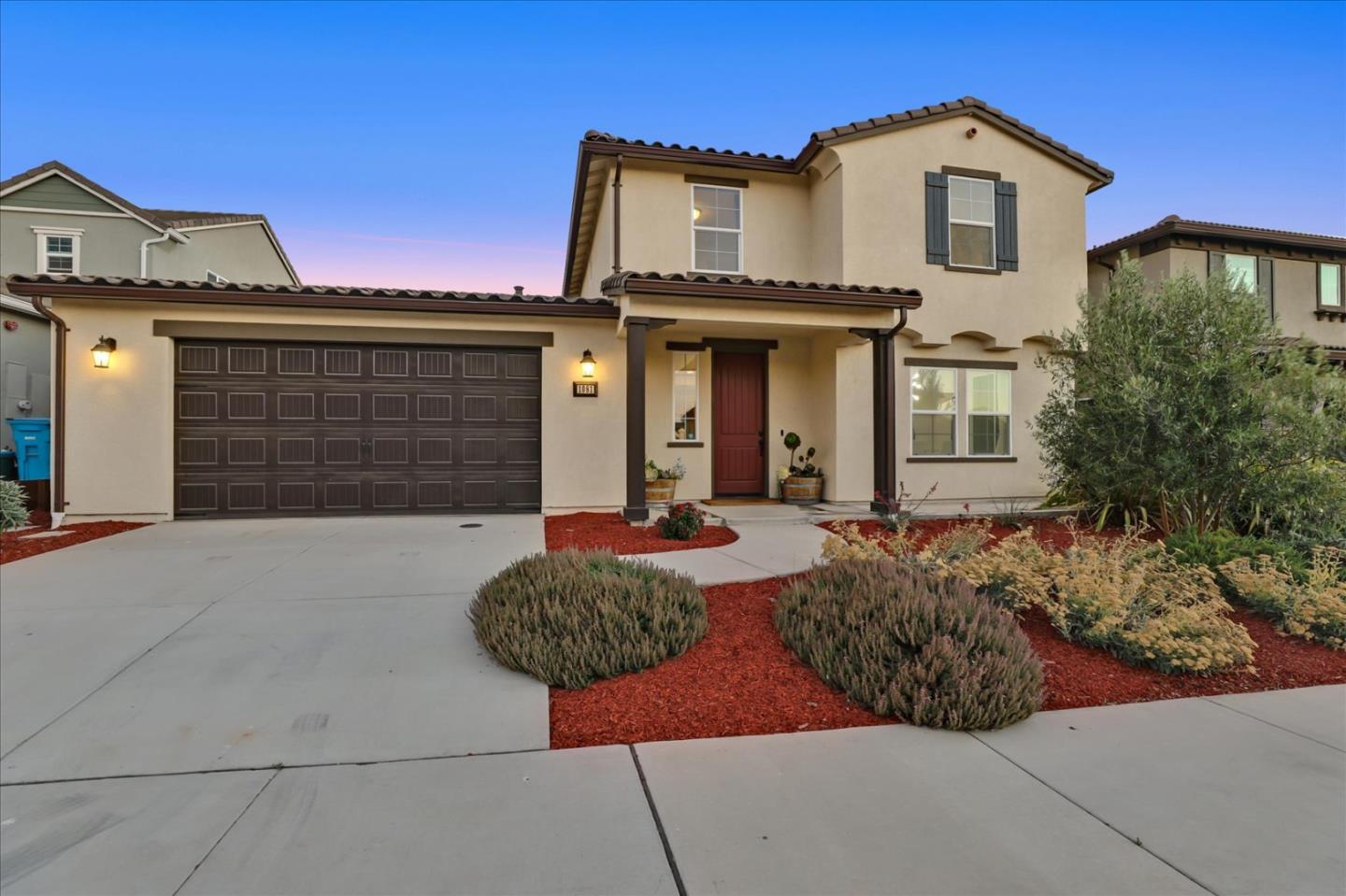 1081 Cabrillo Drive Hollister, CA 95023 - Photo 2 of 60 a front view of a house with garden