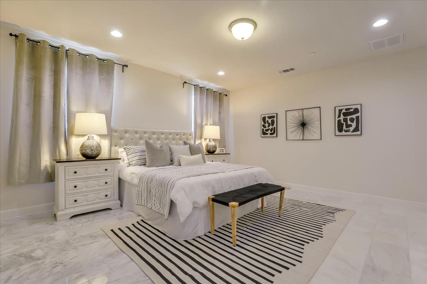 1081 Cabrillo Drive Hollister, CA 95023 - Photo 25 of 60 a bedroom with a bed and a window