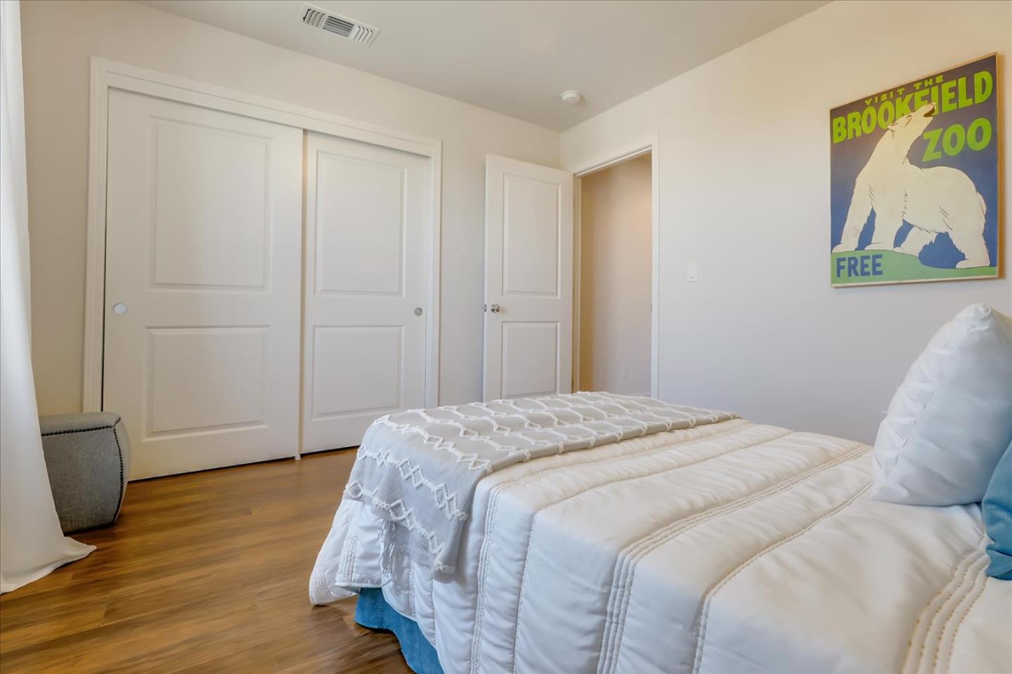 1081 Cabrillo Drive Hollister, CA 95023 - Photo 29 of 60 a bedroom with a bed and painting on the wall