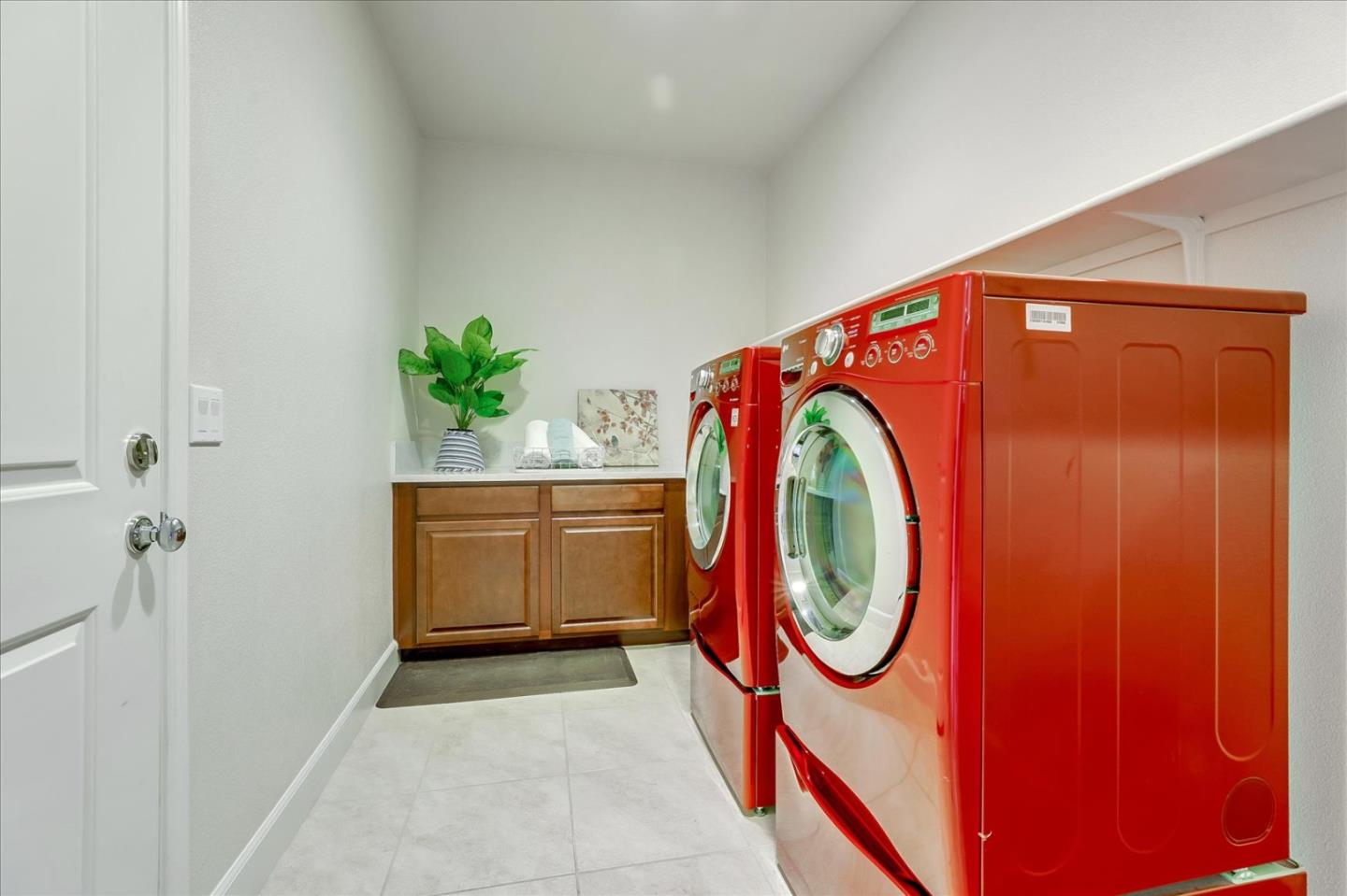 1081 Cabrillo Drive Hollister, CA 95023 - Photo 35 of 60 a utility room with dryer and washer