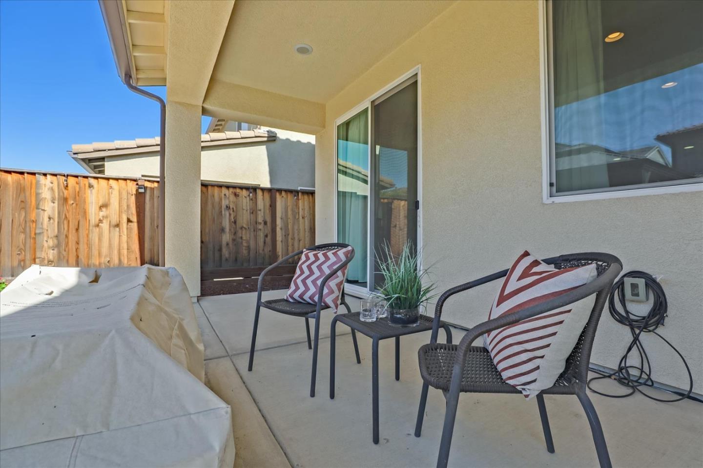 1081 Cabrillo Drive Hollister, CA 95023 - Photo 38 of 60 a view of a dining room with furniture and wooden floor