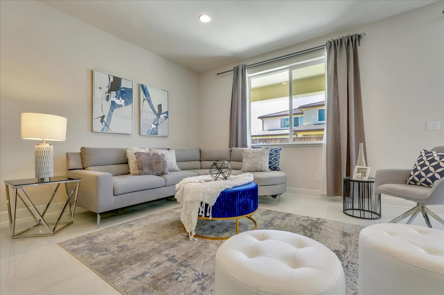 1081 Cabrillo Drive Hollister, CA 95023 - Photo 4 of 60 a living room with furniture and a large window