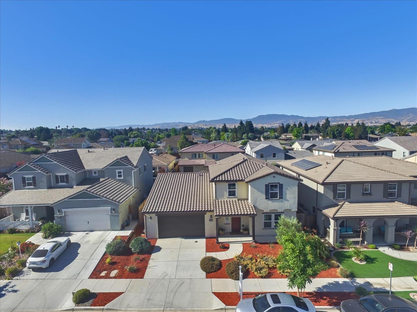 1081 Cabrillo Drive Hollister, CA 95023 - Photo 45 of 60 an aerial view of residential houses and city street