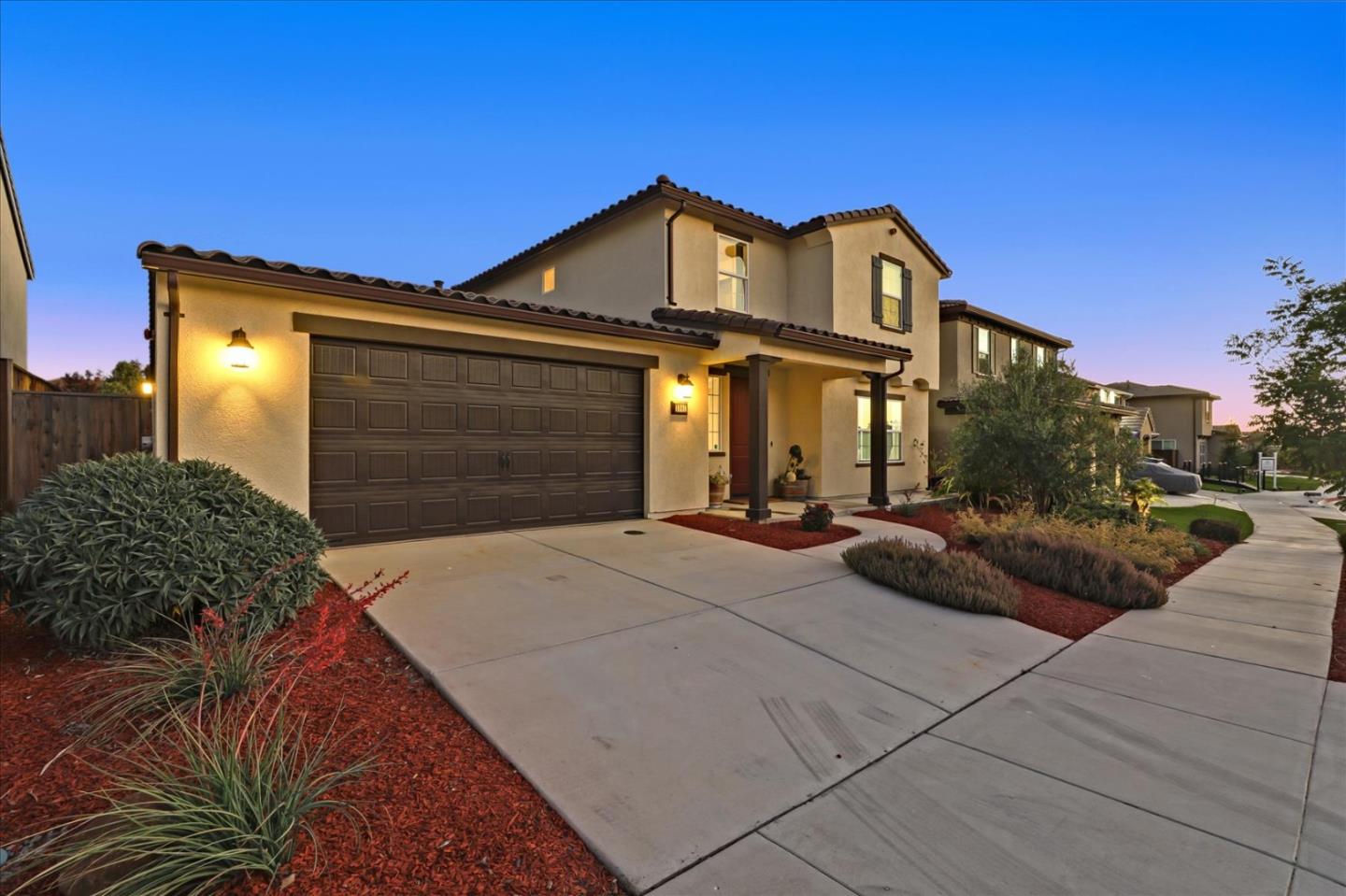 1081 Cabrillo Drive Hollister, CA 95023 - Photo 52 of 60 a view of a building with entryway and a yard