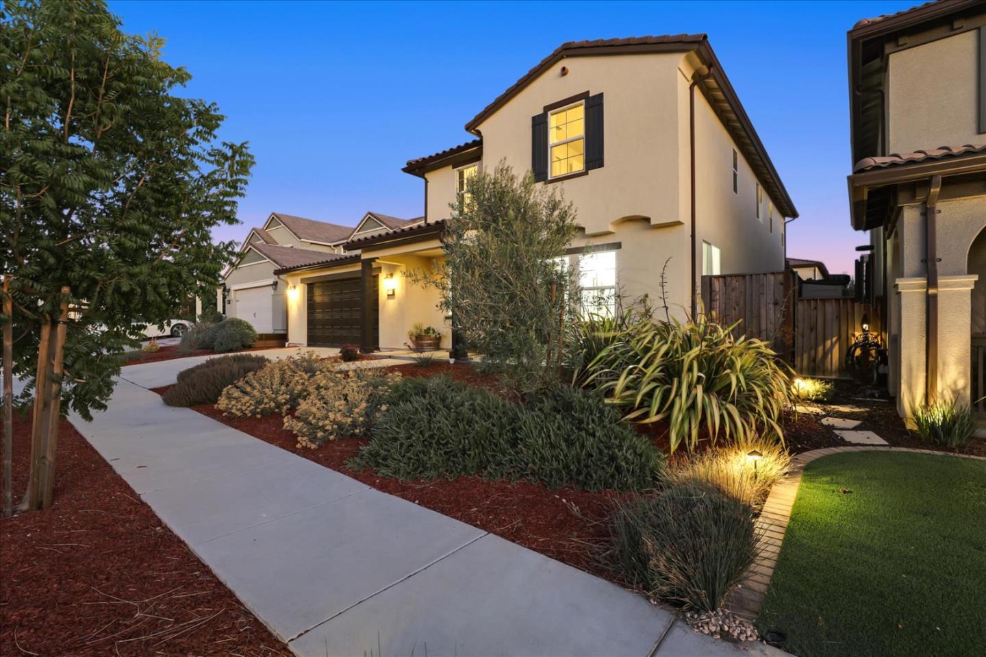 1081 Cabrillo Drive Hollister, CA 95023 - Photo 55 of 60 a front view of a house with a yard