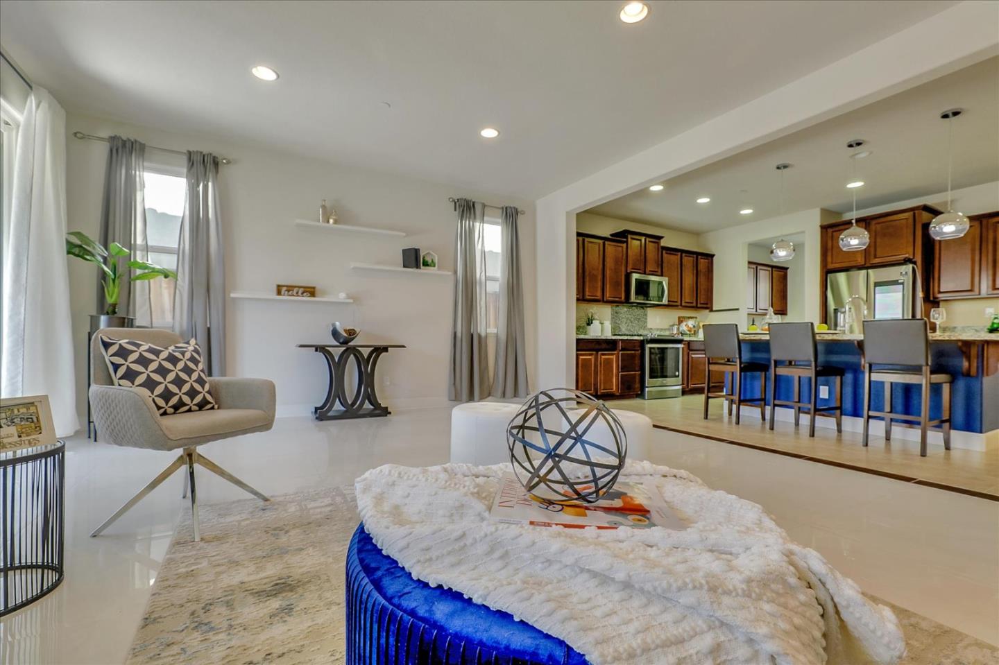 1081 Cabrillo Drive Hollister, CA 95023 - Photo 6 of 60 a living room with furniture and a wooden floor