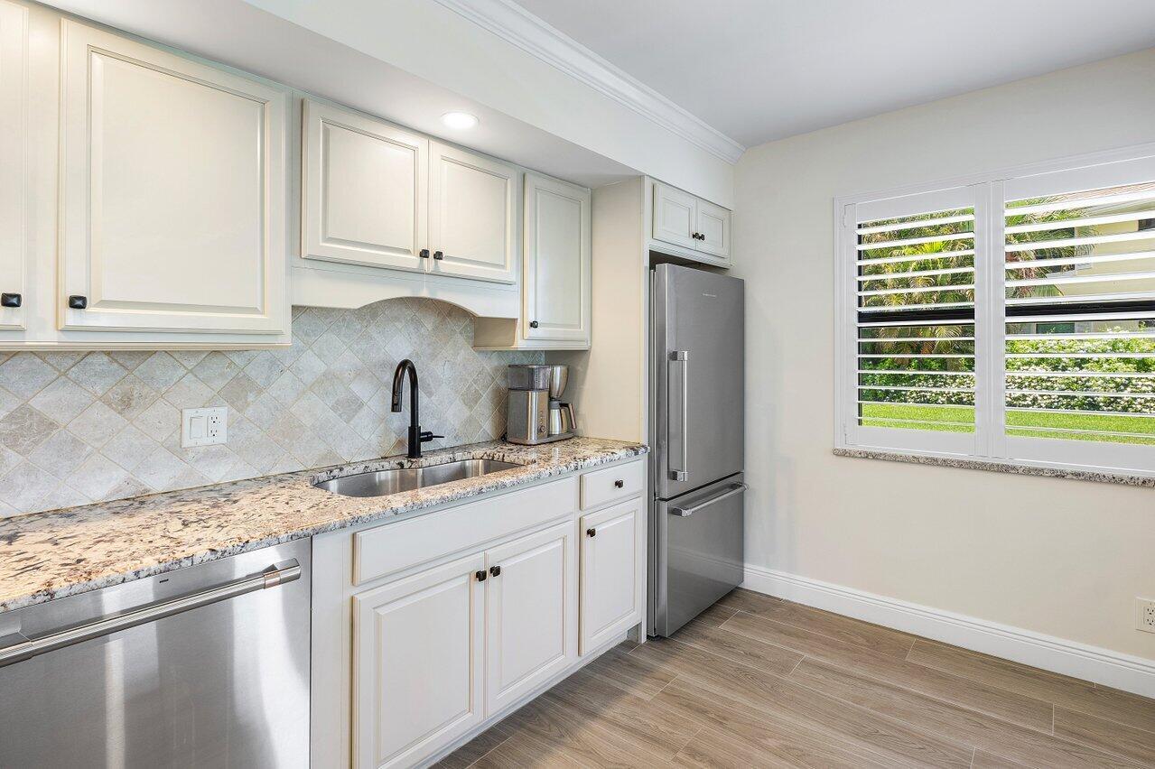 3721 North Quail Ridge Drive, Unit BOBWHITE C Boynton Beach, FL 33436 - Photo 16 of 51 Kitchen