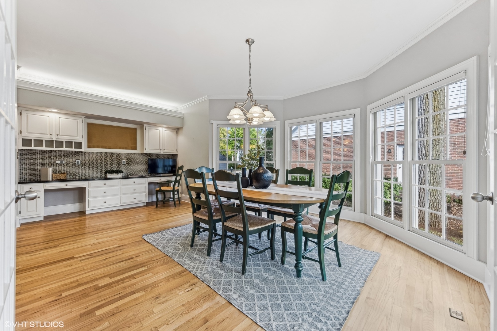 437 Stagecoach Run Glen Ellyn, IL 60137 - Photo 18 of 45 a dining room with furniture window wooden floor