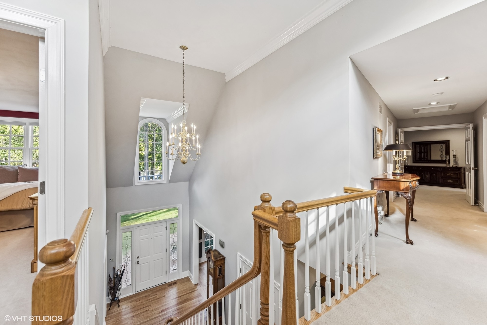437 Stagecoach Run Glen Ellyn, IL 60137 - Photo 23 of 45 a view of a hallway with furniture and a ceiling fan