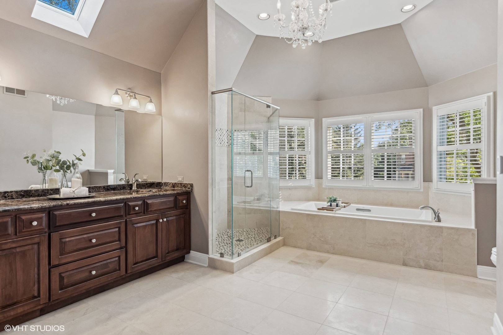 437 Stagecoach Run Glen Ellyn, IL 60137 - Photo 27 of 45 a spacious bathroom with a tub a double vanity sink a large mirror and a bathtub