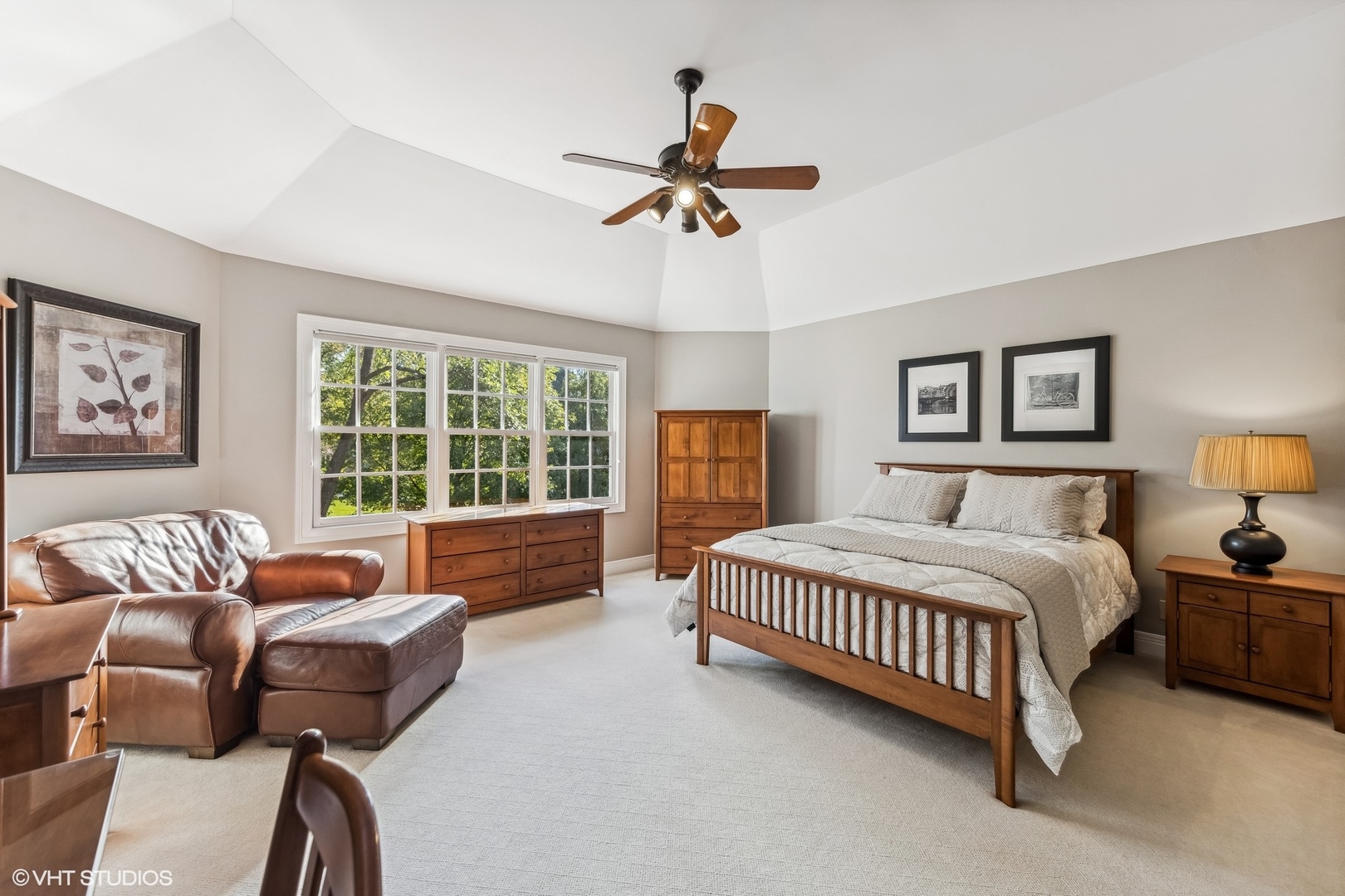 437 Stagecoach Run Glen Ellyn, IL 60137 - Photo 29 of 45 a spacious bedroom with a bed and a couch