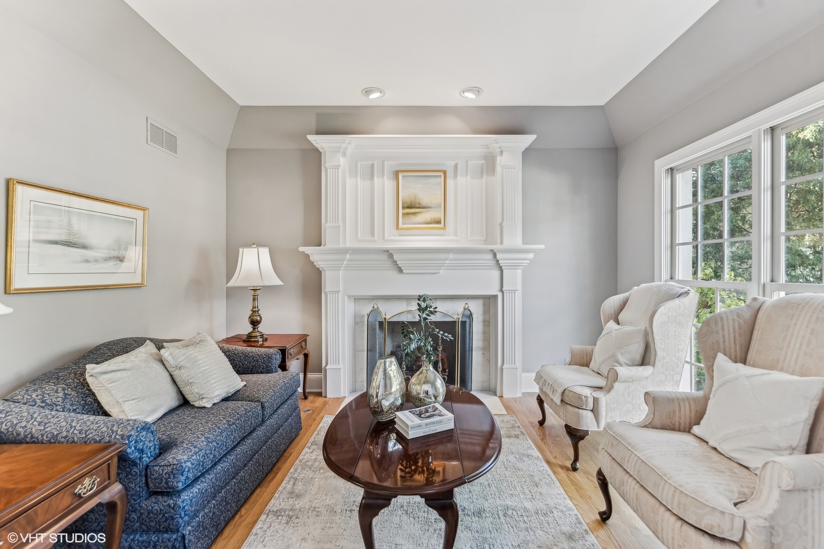 437 Stagecoach Run Glen Ellyn, IL 60137 - Photo 4 of 45 a living room with furniture a window and a fireplace