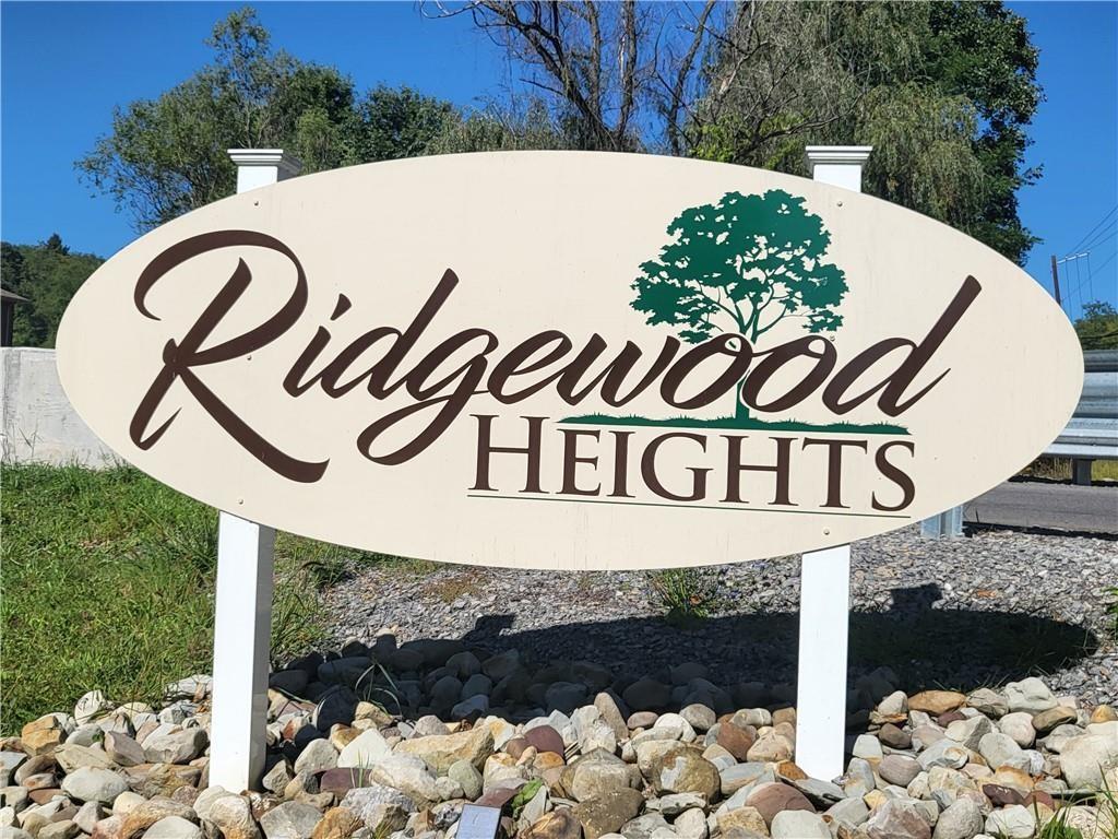 Lot 18 Ridgewood McDonald, PA 15057 - Photo 2 of 19 a street sign that is on a pole