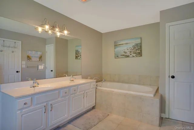 a bathroom with a shower and a tub