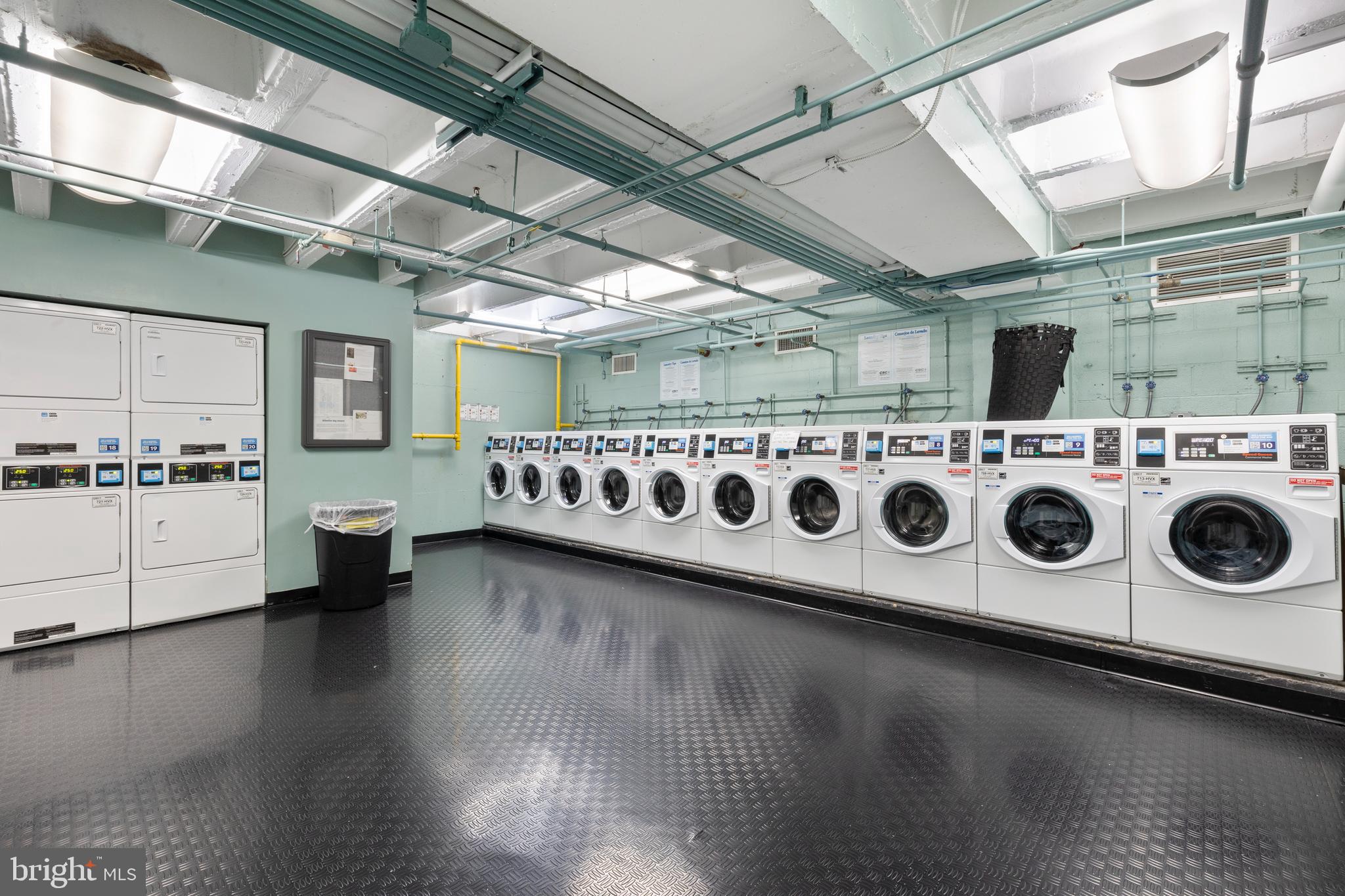 1101 3rd Street Southwest, Unit 705 Washington, DC 20024 - Photo 29 of 38 a utility room with stainless steel appliances wooden floors and view