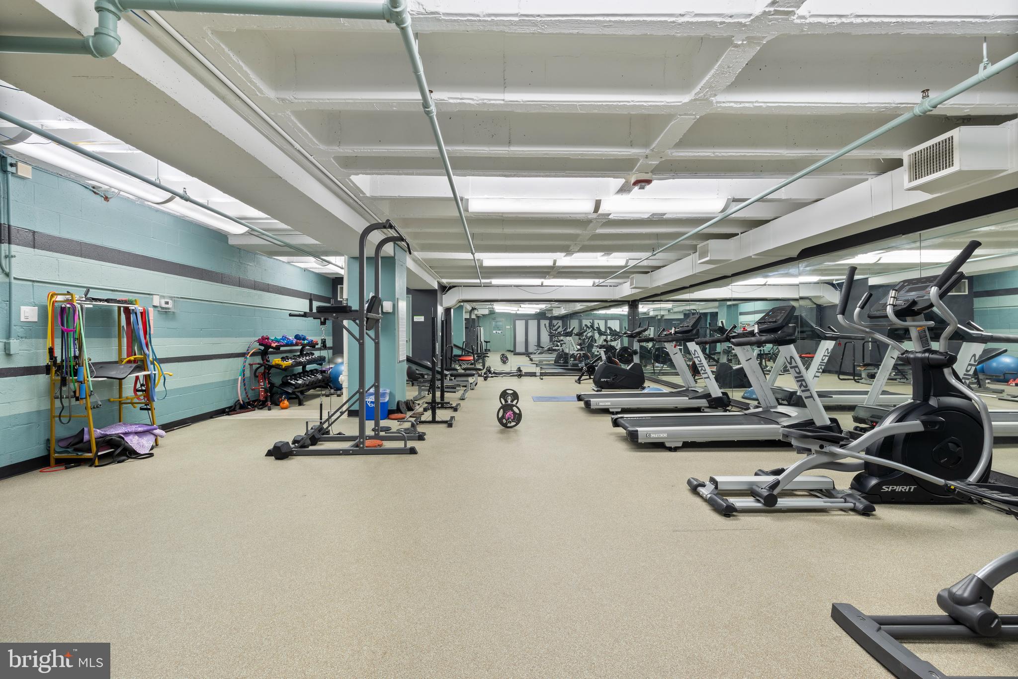 1101 3rd Street Southwest, Unit 705 Washington, DC 20024 - Photo 31 of 38 a view of a room with gym equipment