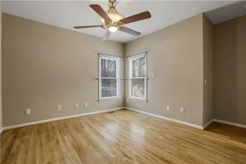 a view of balcony with wooden floor and wall