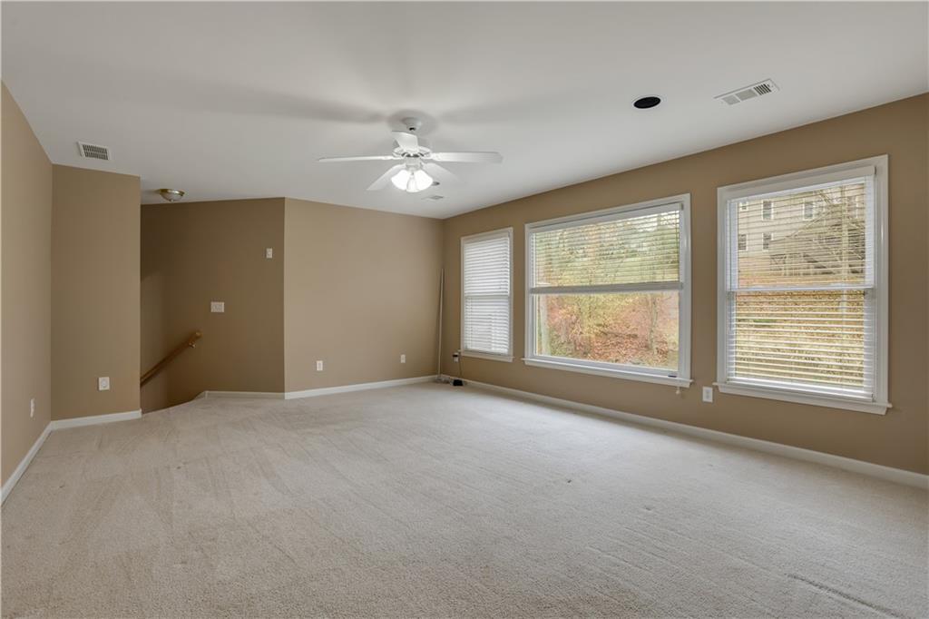 803 Rocky Ridge Court Canton, GA 30114 - Photo 47 of 74 a view of an empty room with a window