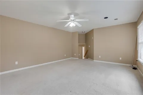 an aerial view of residential house with outdoor space