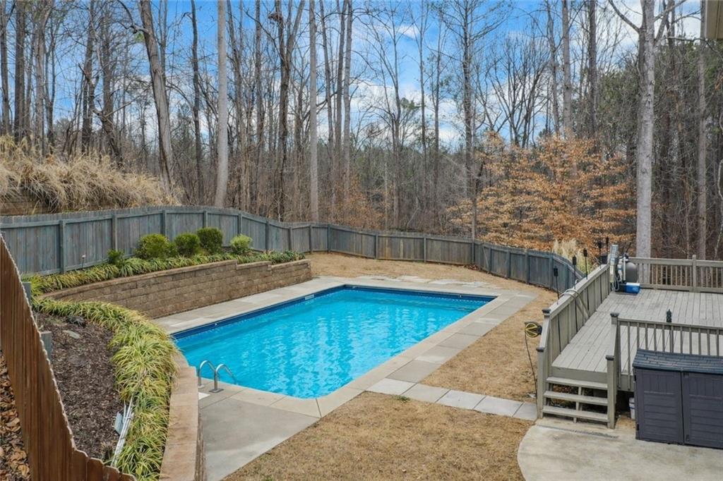 803 Rocky Ridge Court Canton, GA 30114 - Photo 65 of 74 a view of a swimming pool with a patio