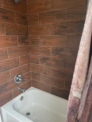 a bathroom with a bathtub