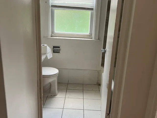 a bathroom with a toilet