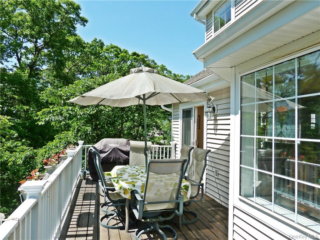 107 Winding Ridge Road, Unit 107 White Plains, NY 10603 - Photo 12 of 30 a view of a patio with furniture and yard