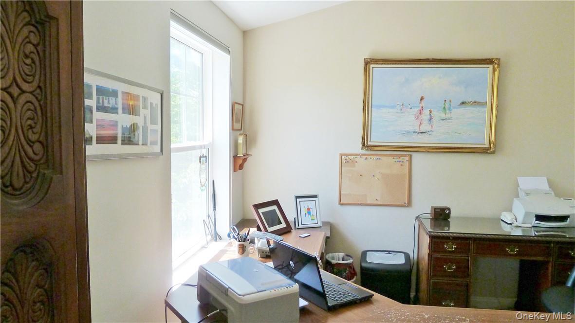 107 Winding Ridge Road, Unit 107 White Plains, NY 10603 - Photo 14 of 30 a view of a workspace with furniture and a window
