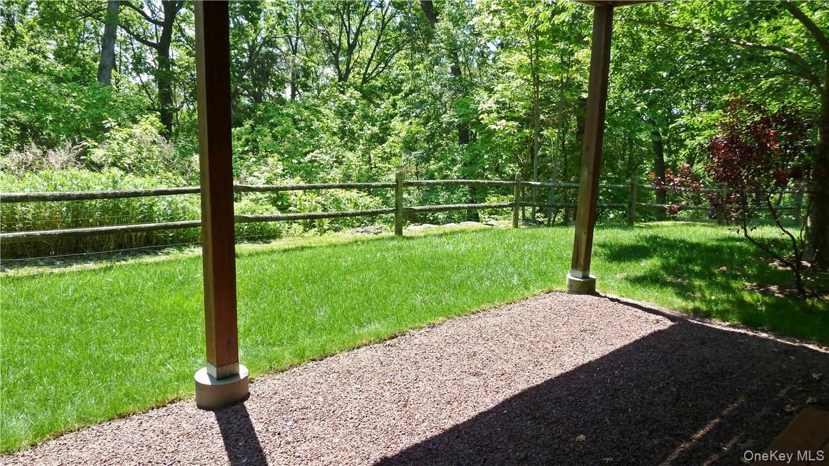107 Winding Ridge Road, Unit 107 White Plains, NY 10603 - Photo 22 of 30 a view of a backyard with a garden