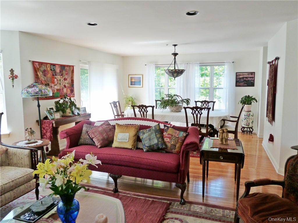 107 Winding Ridge Road, Unit 107 White Plains, NY 10603 - Photo 8 of 30 a living room with furniture and a large window