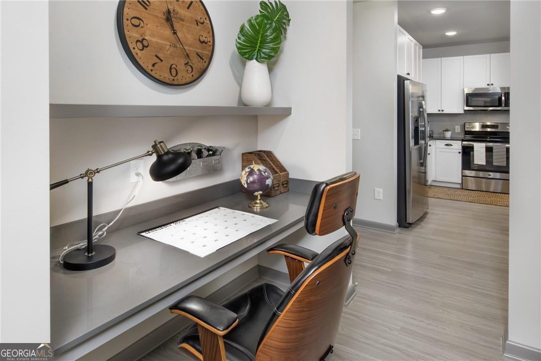 6919 Peachtree Road, Unit 545 Atlanta, GA 30328 - Photo 14 of 38 Dining room with light wood-type flooring