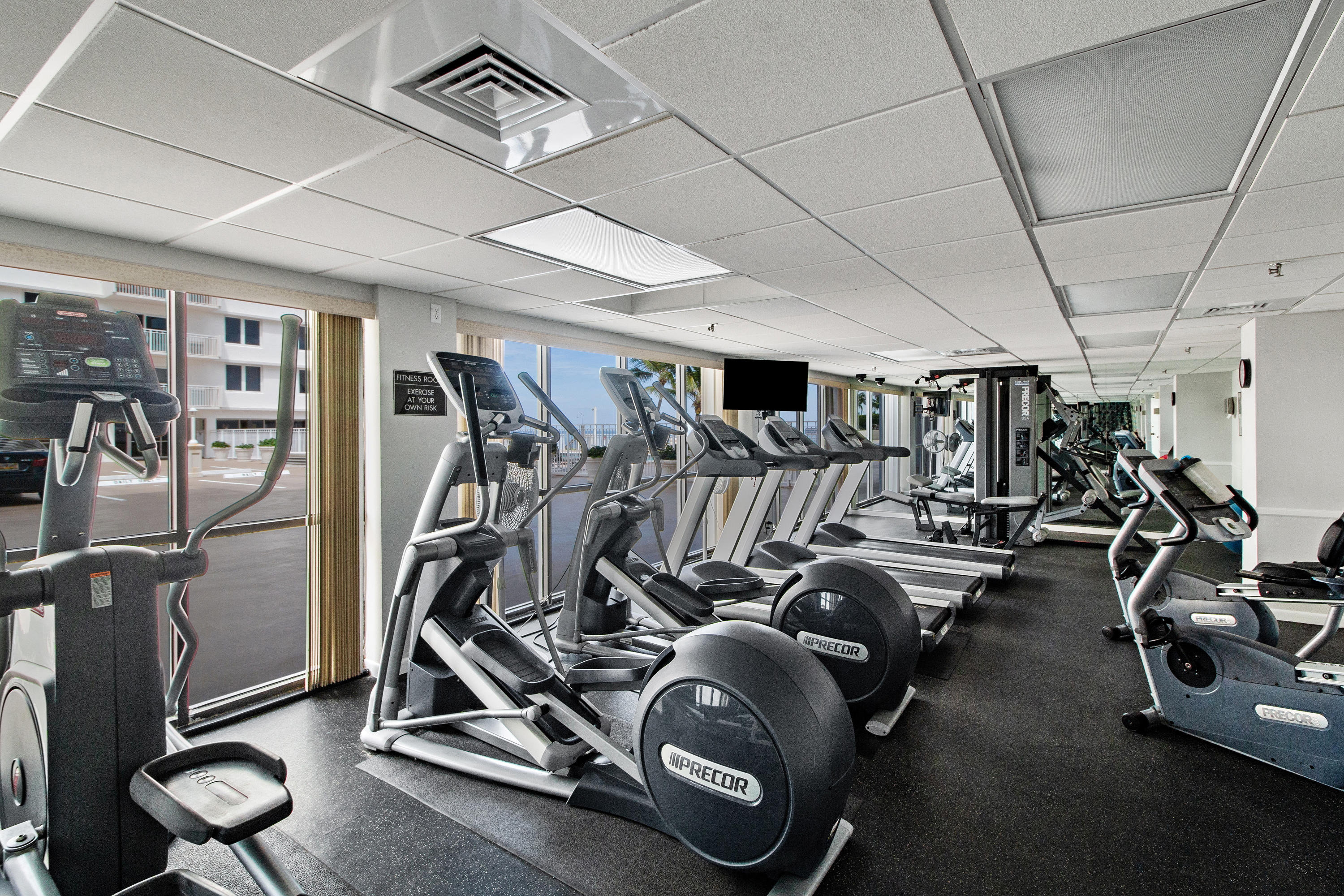 3215 South Ocean Boulevard, Unit 707 Highland Beach, FL 33487 - Photo 25 of 37 a view of a room with gym equipment