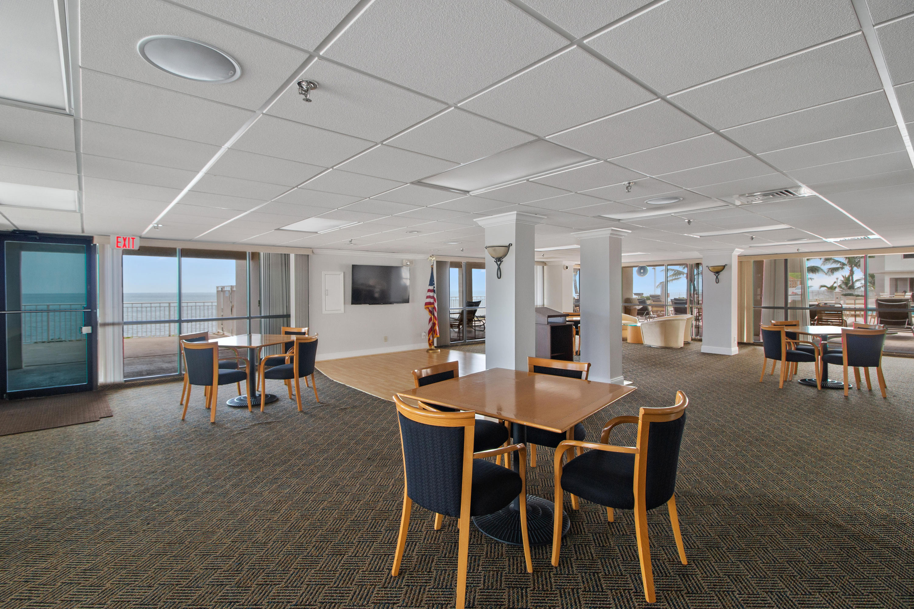 3215 South Ocean Boulevard, Unit 707 Highland Beach, FL 33487 - Photo 29 of 37 a dining room with furniture and window