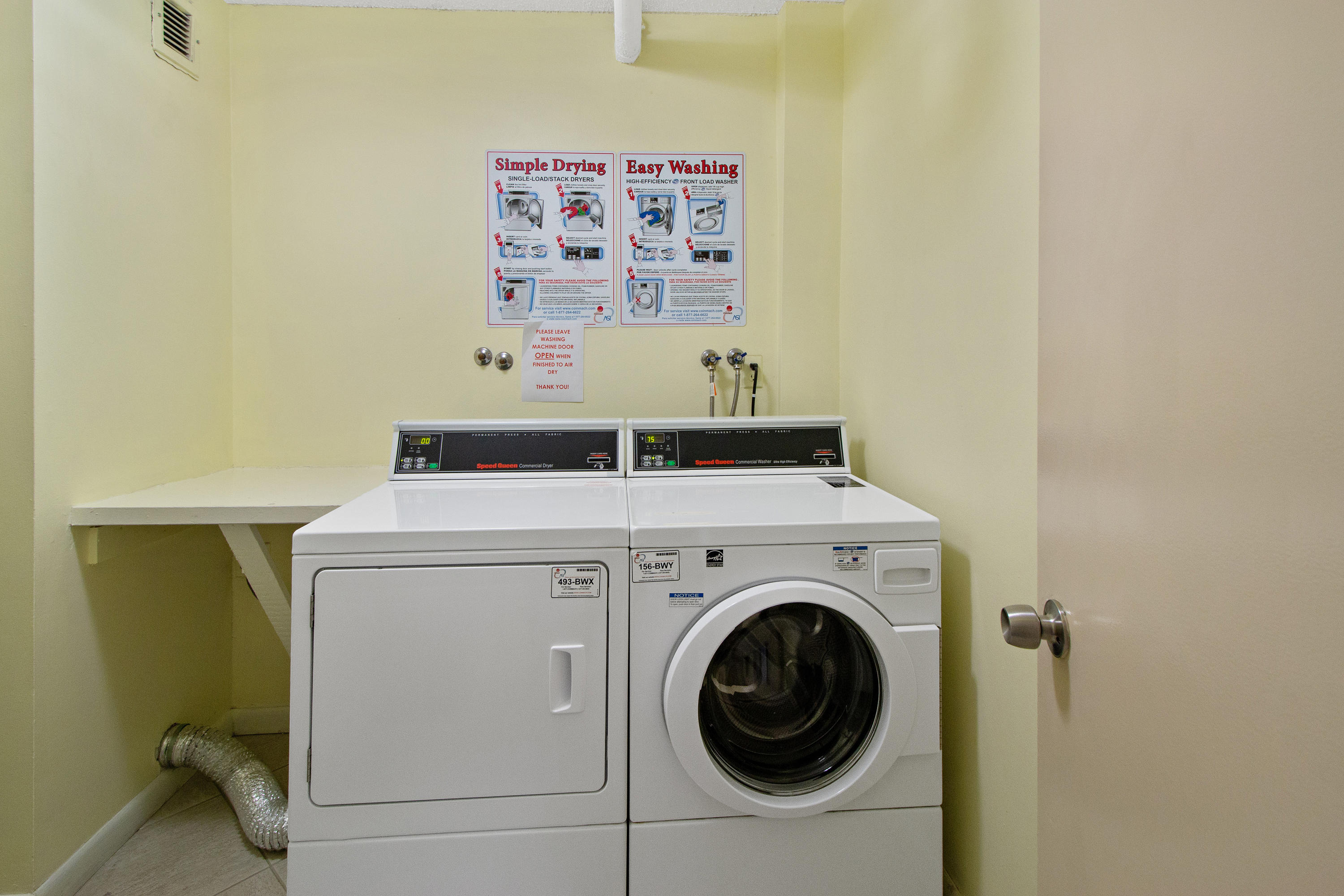 3215 South Ocean Boulevard, Unit 707 Highland Beach, FL 33487 - Photo 30 of 37 a utility room with dryer and washer