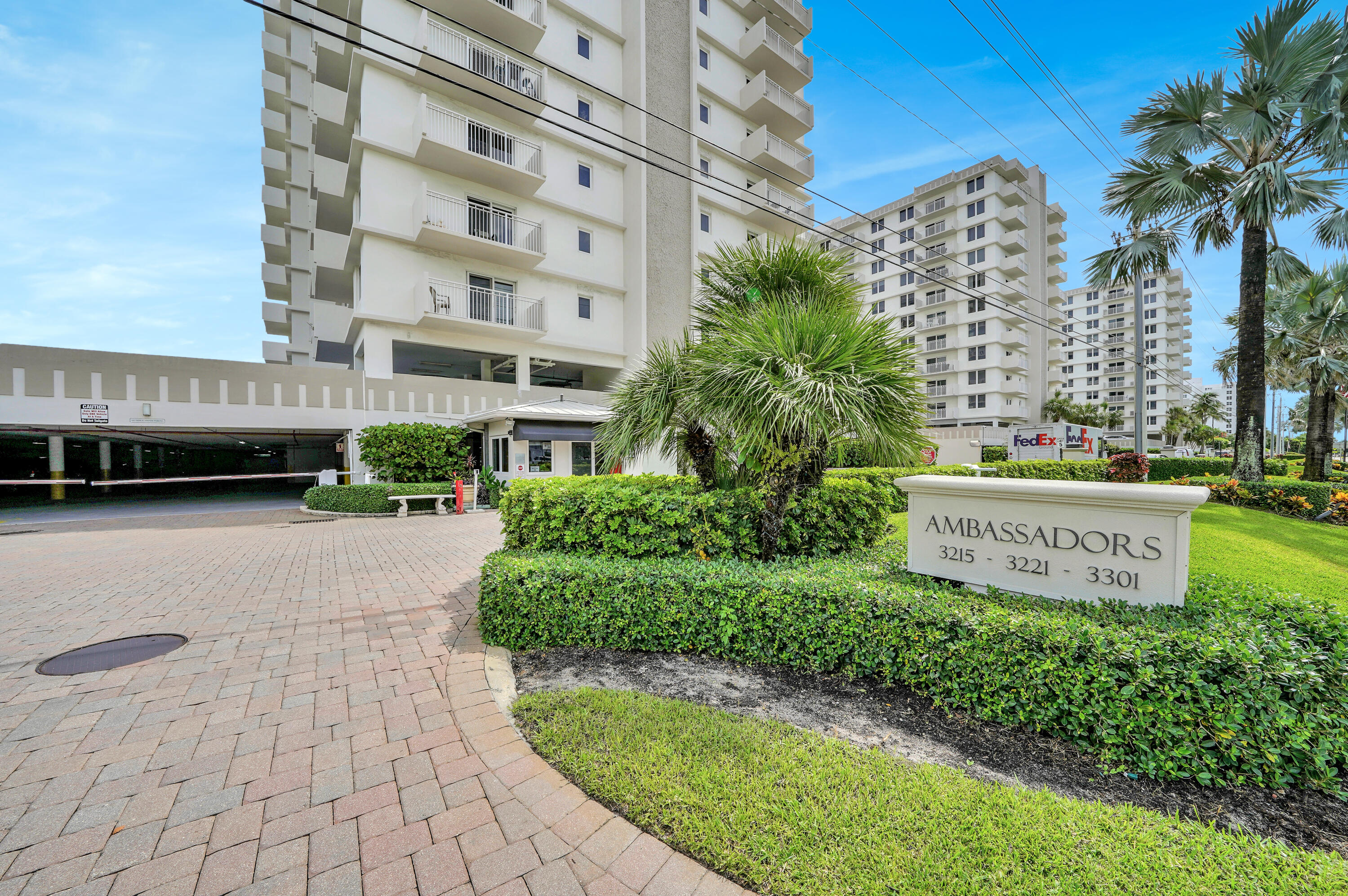3215 South Ocean Boulevard, Unit 707 Highland Beach, FL 33487 - Photo 33 of 37 a front view of a building with garden
