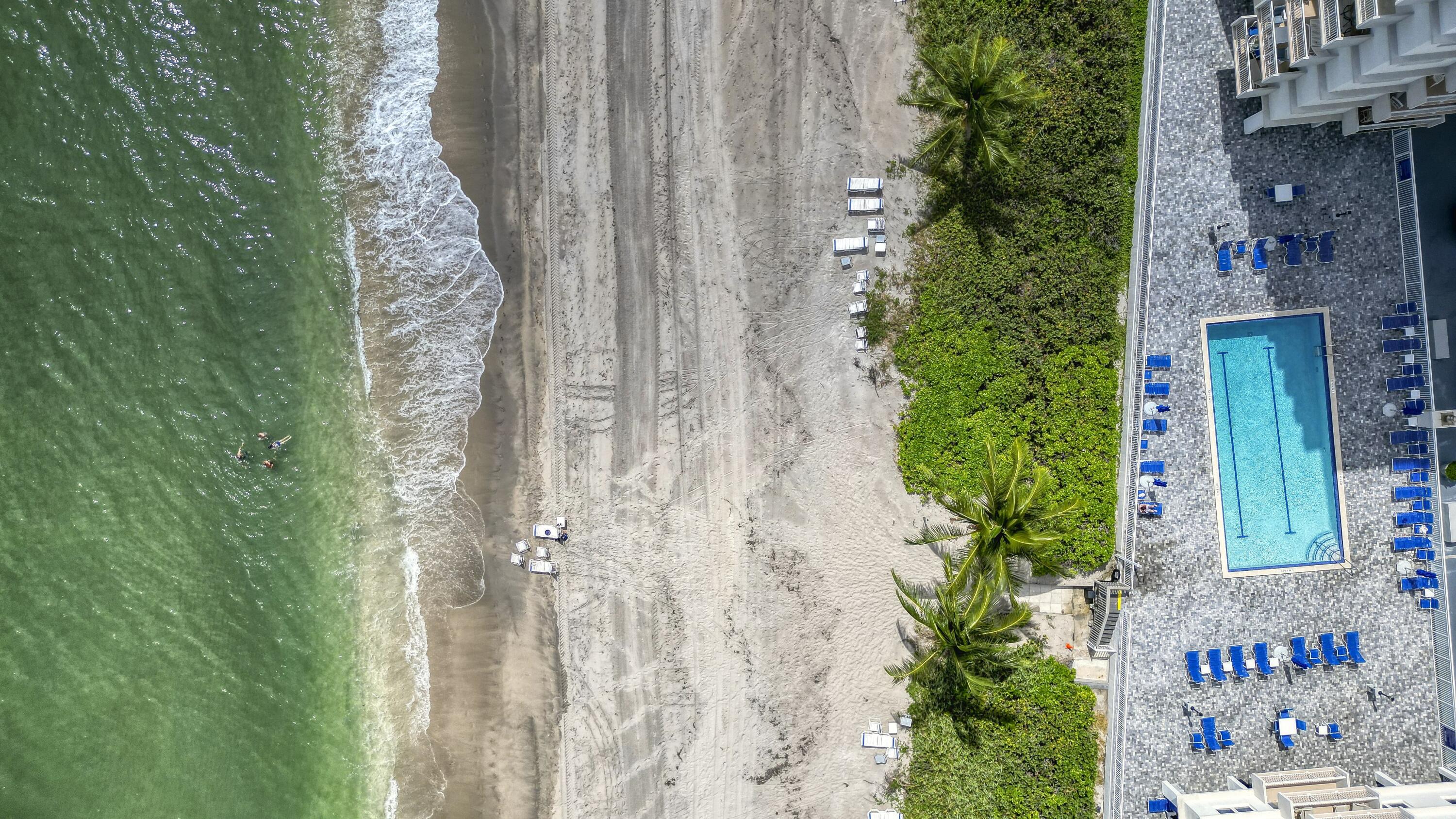 3215 South Ocean Boulevard, Unit 707 Highland Beach, FL 33487 - Photo 34 of 37 an aerial view of a house with a backyard