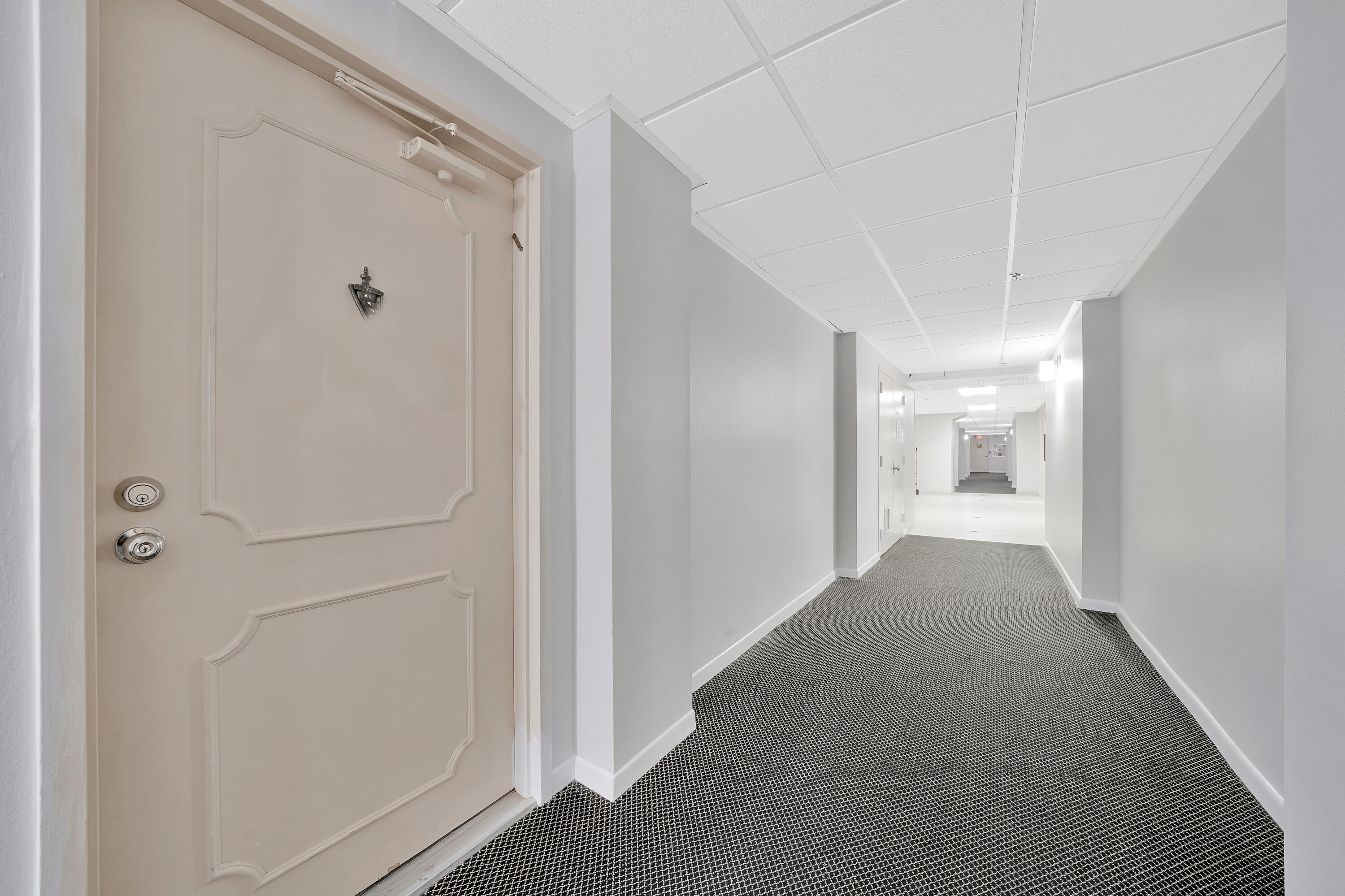 3215 South Ocean Boulevard, Unit 707 Highland Beach, FL 33487 - Photo 36 of 37 a view of a hallway