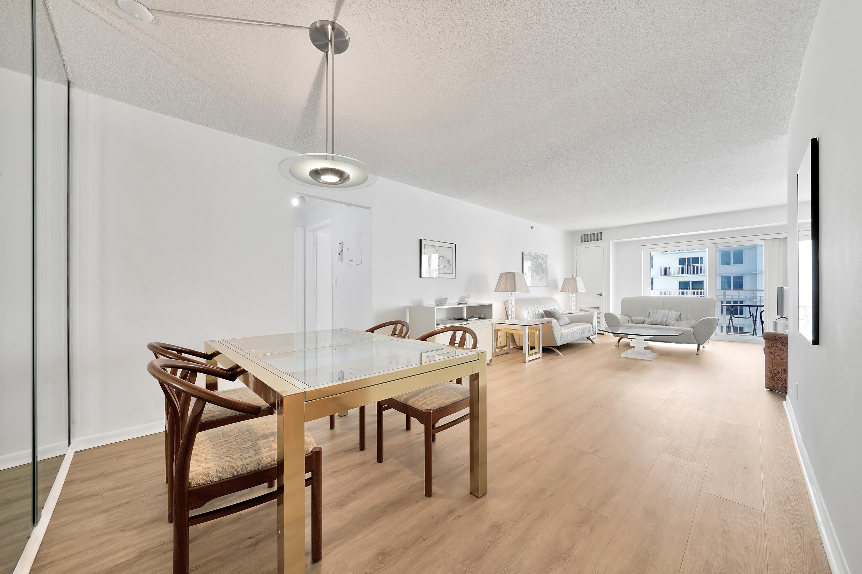 3215 South Ocean Boulevard, Unit 707 Highland Beach, FL 33487 - Photo 6 of 37 a view of a livingroom and dining room