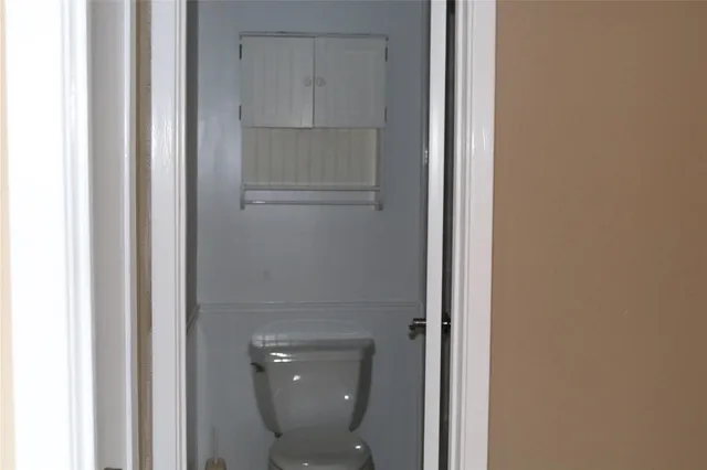 a bathroom with a toilet