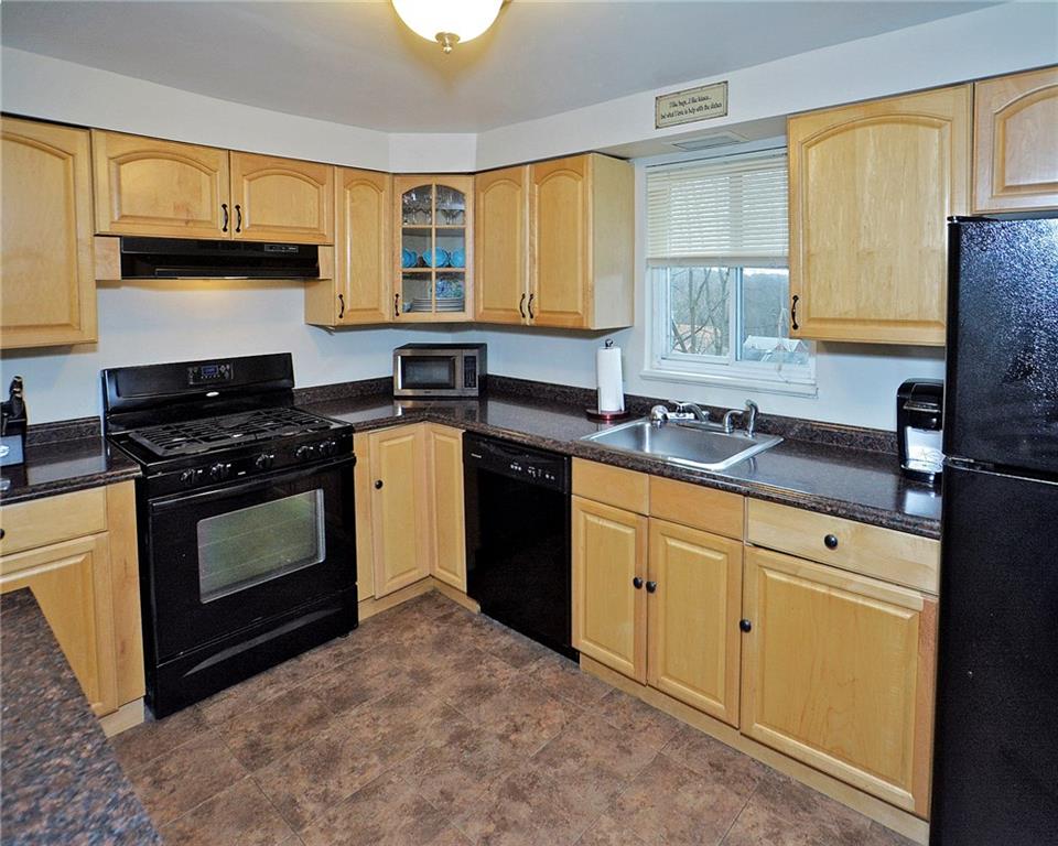 6409 Verona Road Verona, PA 15147 - Photo 3 of 21 Nicely updated kitchen with plenty of cabinetry.