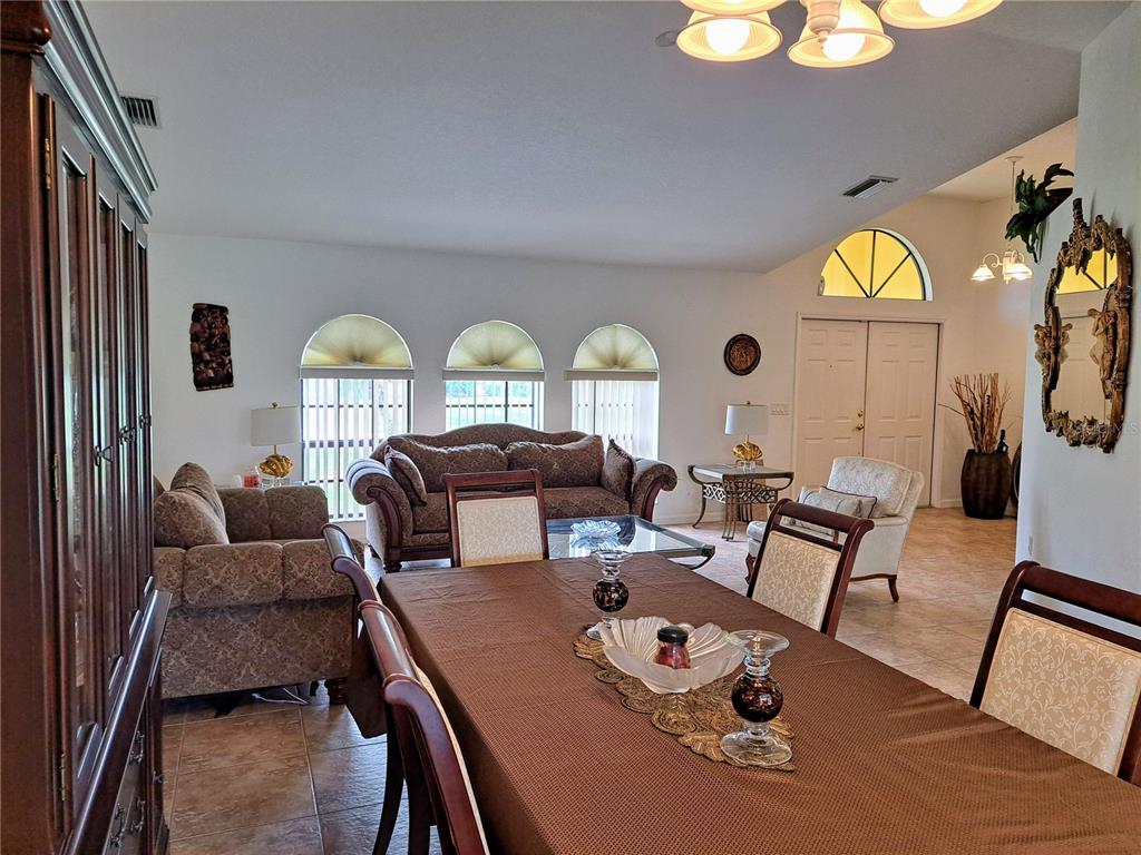 23180 Avacado Avenue Punta Gorda, FL 33980 - Photo 6 of 30 a living room with furniture and wooden floor
