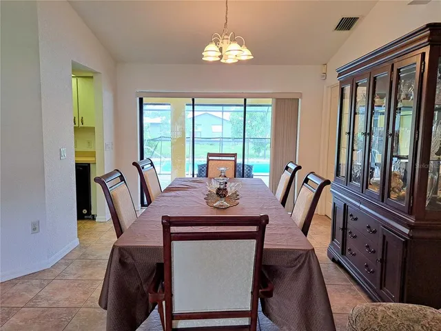 a bedroom with a bed and dresser