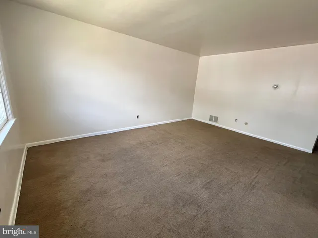an empty room with an entryway