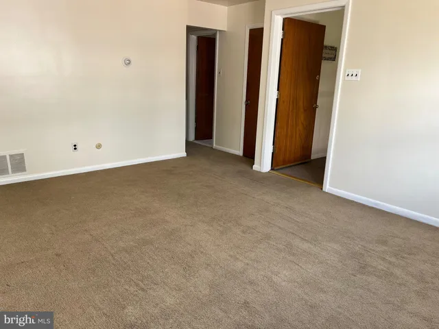 an empty room with closet