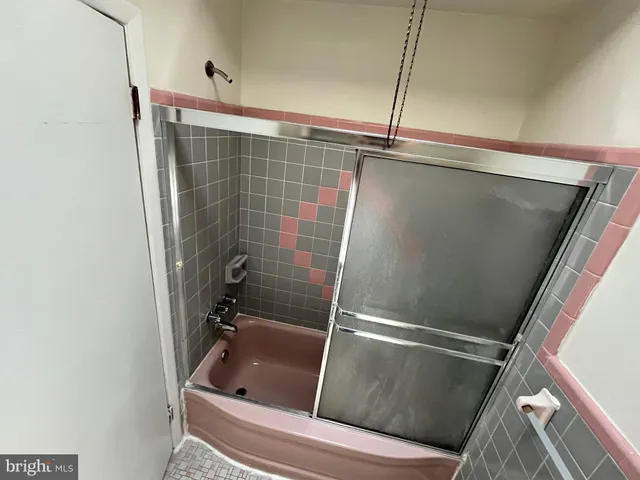 a bathroom with a bathtub