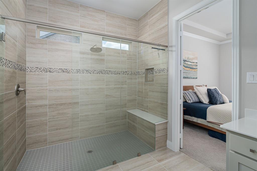 1412 Bear Path Way Gunter, TX 75058 - Photo 13 of 37 a bathroom with a bathtub and a shower