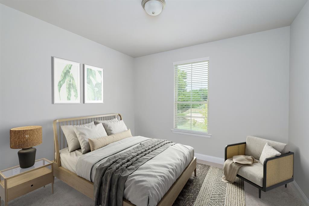 1412 Bear Path Way Gunter, TX 75058 - Photo 20 of 37 a bedroom with bed and a couch