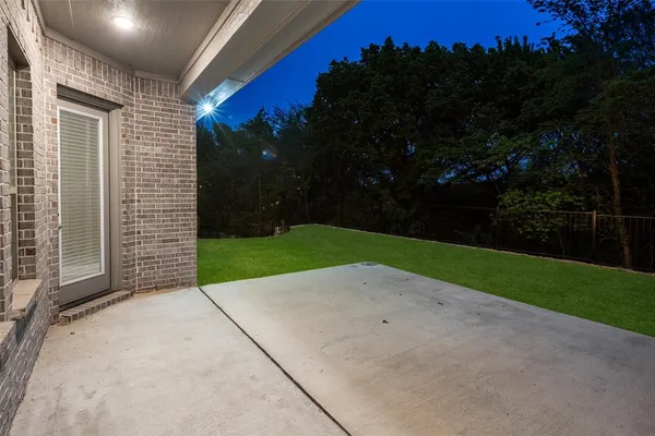 a view of backyard with green space
